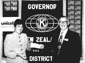 Picture of 
  Ian handing over check.