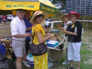 Kiwanians folding stubs for the raffle draw