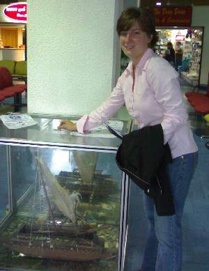 Amy Wiser with the Kiwanis collection box